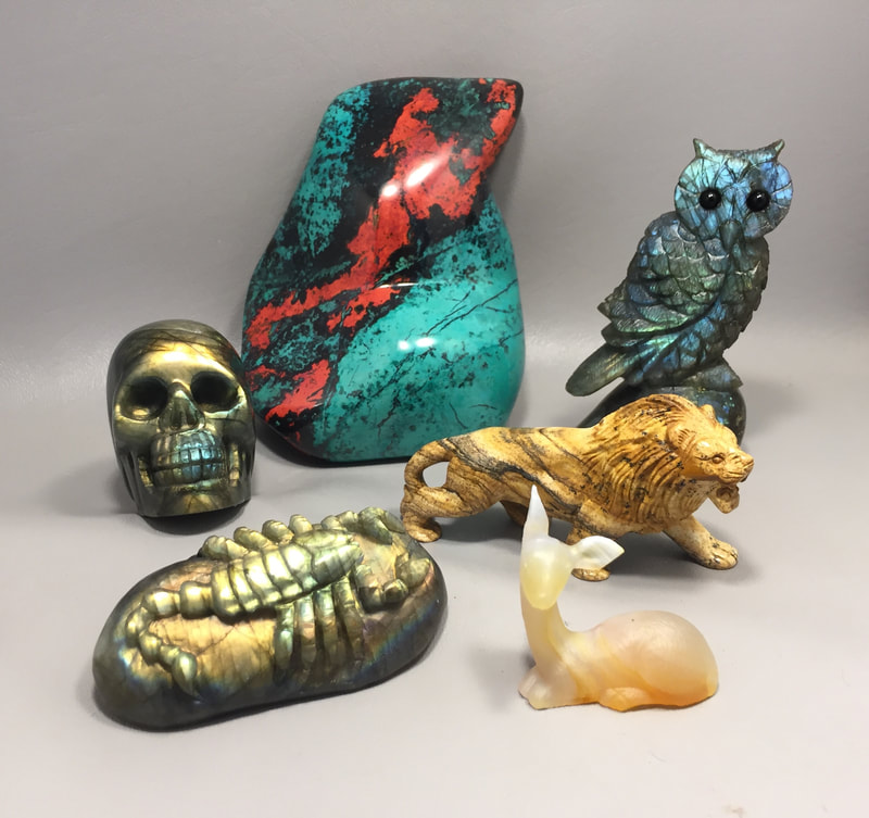 Gemstone animal carvings.